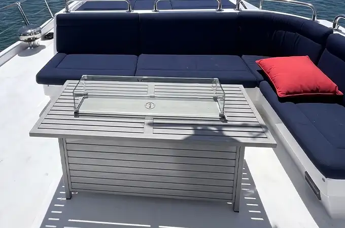 Indoor yacht lounge with TV and seating