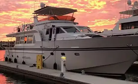 Full Circle Yacht docked at sunset