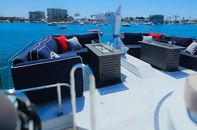 Open-air top deck seating aboard Full Circle Yacht