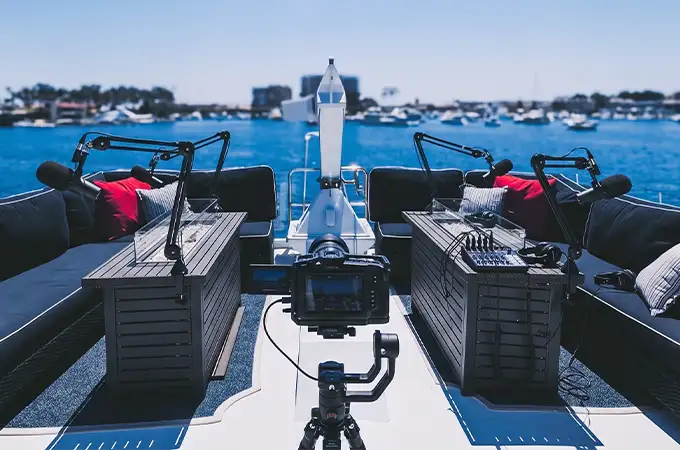 Dockside podcast recording setup on Full Circle Yacht top deck