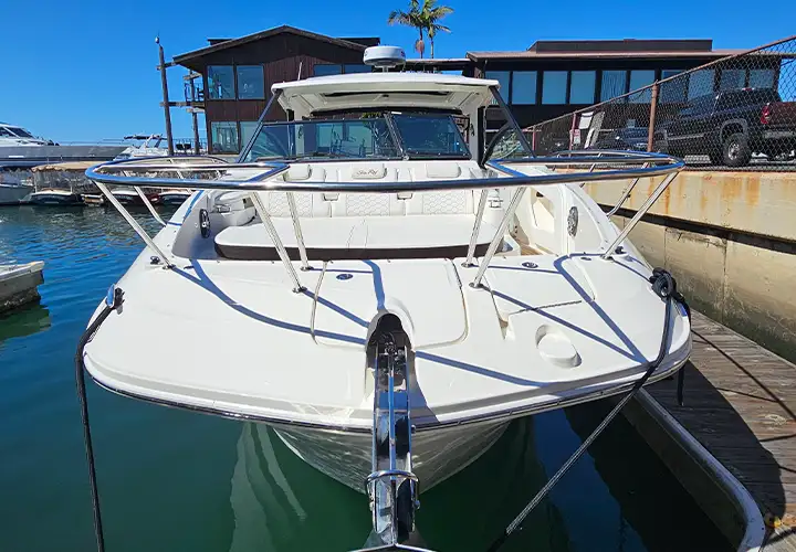 Sea Ray viewed head-on from the dock with the hardtop above the bow