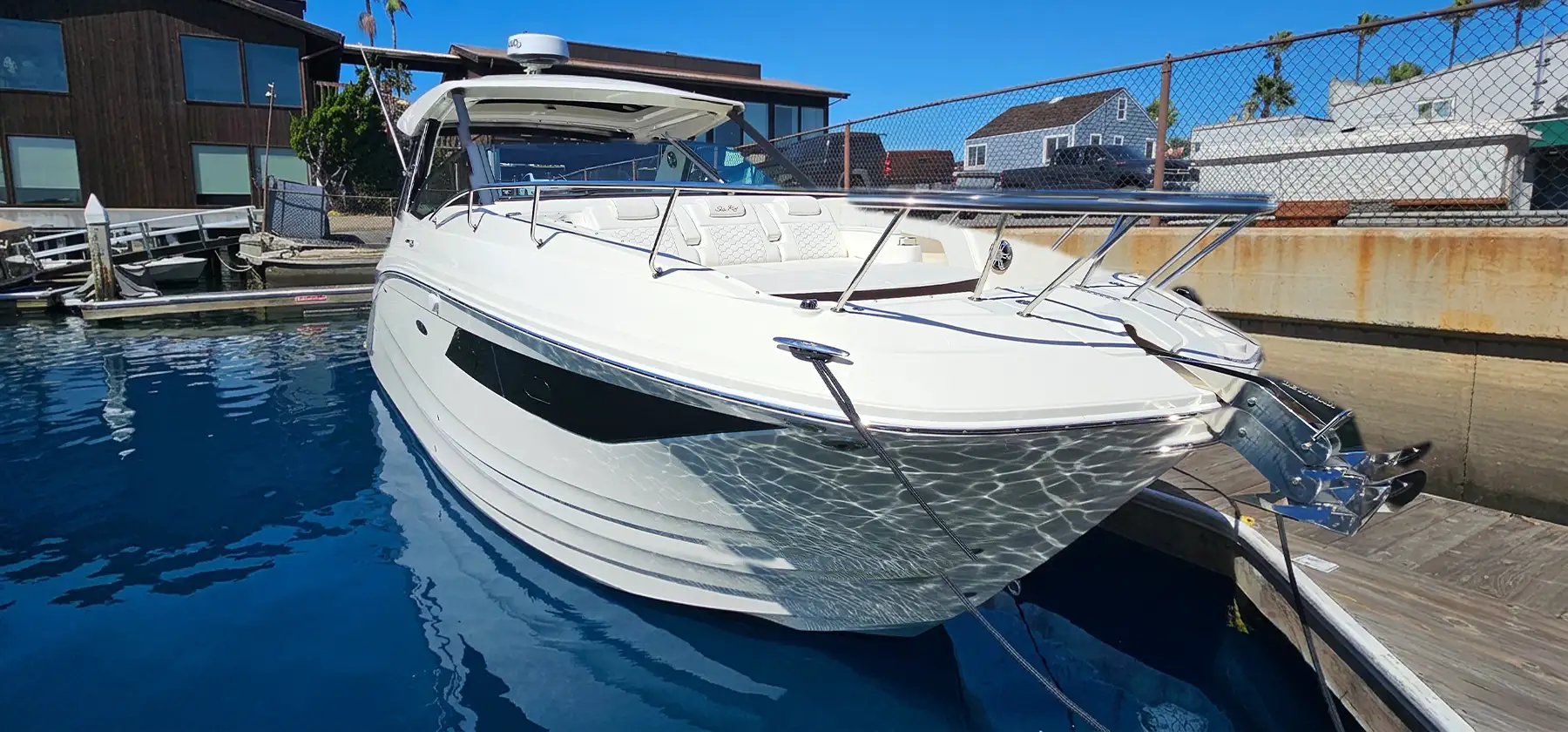 Our white Sea Ray 35ft at the dock in Newport Beach